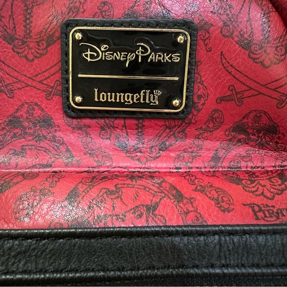 Disney Parks Loungefly Pirates of the Caribbean red and black mini backpack. - Picture 2 of 6